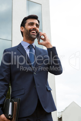 Businessman talking on mobile phone