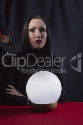 Fortune teller with a magic ball