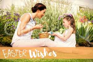 Composite image of mother and daughter collecting easter eggs