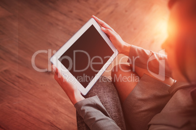 Businesswoman using tablet