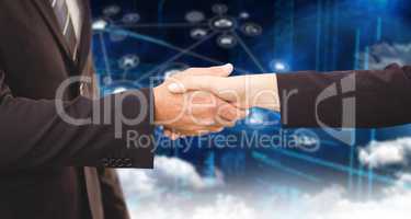 Composite image of executives shaking hands