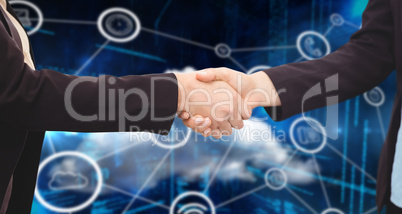 Composite image of businessman shaking hands with colleague