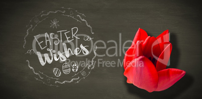 Composite image of easter wishes logo against black background