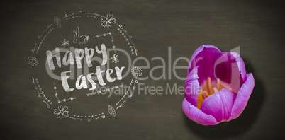 Composite image of happy easter white logo against a black background