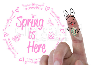 Composite image of digitally composite image of fingers representing easter bunny