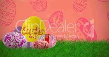 Composite image of multi colored patterned easter eggs