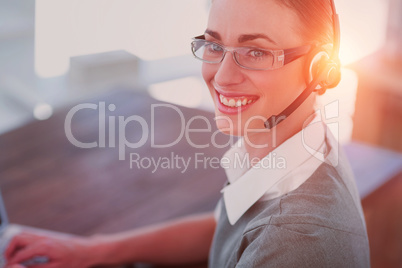 Close-up view of happy businesswoman with headset