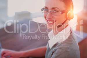 Close-up view of happy businesswoman with headset