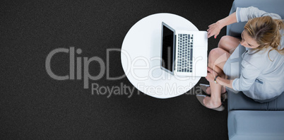 Composite image of woman on her laptop