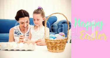 Composite image of mother and daughter painting easter eggs