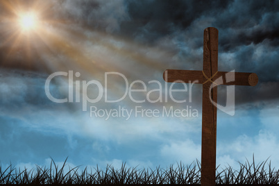 Composite image of wooden cross