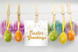 Composite image of easter greetings logo