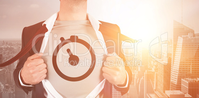 Midsection of businessman opening shirt in superhero style