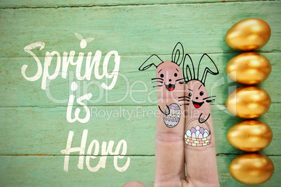 Composite image of illustration of fingers representing easter bunny