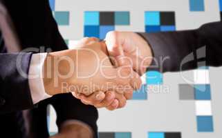 Composite image of male and female corporates shaking hands