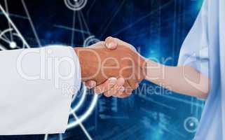 Composite image of medical practitioner shaking hands with patient