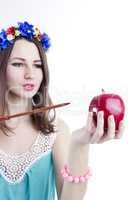 Lovely woman hands an apple