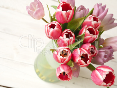 Bunch of tulips on wood