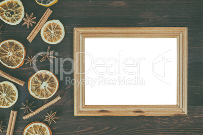 Empty wooden frame on a brown surface
