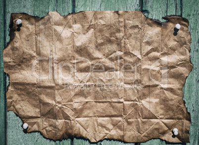 Burnt brown crumpled sheet of paper