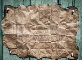 Burnt brown crumpled sheet of paper