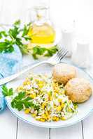 Vegetable cabbage salad and meatballs on plate close up, white background