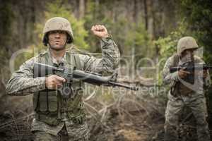 Military soldiers during training exercise with weapon