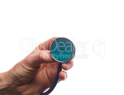 Hand with stethoscope on white