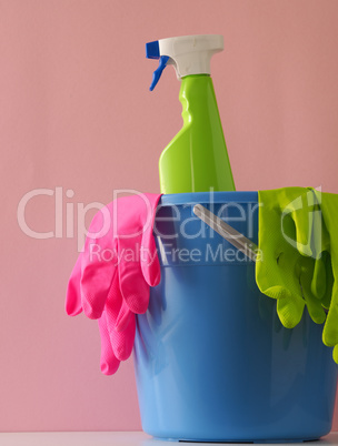Plastic bucket with cleaning utensils