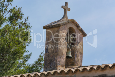 Church tower with bell in Spanish style