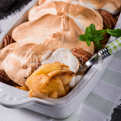 Baked apples with nuts and meringue