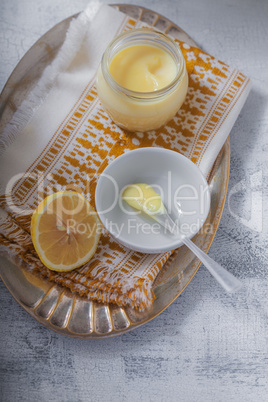 Lemon kurd with a spoon