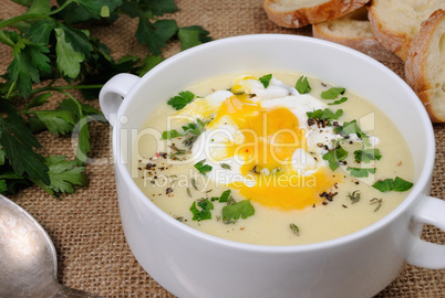 potato cream soup with poached eggs