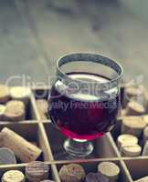 Glass of red wine, vintage color toned