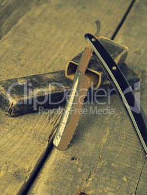 Vintage barber concept with rusty razor