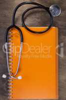 Stethoscope and notebook