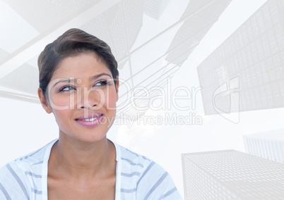 Woman smiling knowingly against skyscraper background