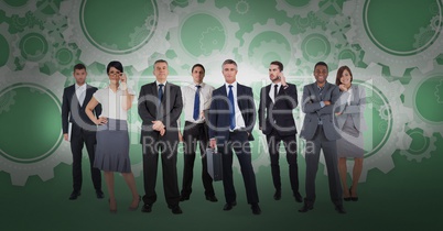 Digital composite image of business people with gear background