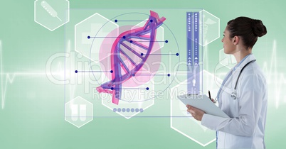 Female doctor analyzing DNA structure on screen