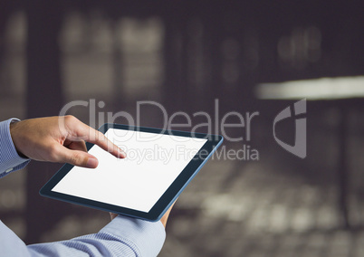 hands with tablet in a terrace