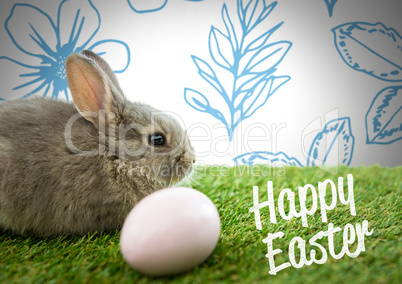 Happy Easter text with Easter rabbit with egg in front of pattern
