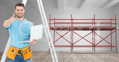 Builder with ladder and computer in font of 3D scaffolding
