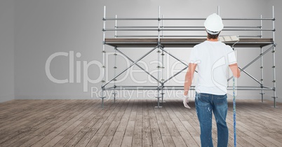 Painter in front of 3D scaffolding