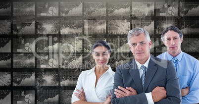 Confident business people with graph background