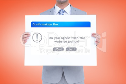 Digital composite image of businessman holding confirmation box