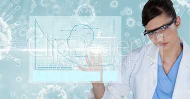Digital composite image of female doctor touching screen