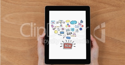 Hands holding digital tablet with new idea icons