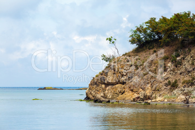 Rocky cliff and sea