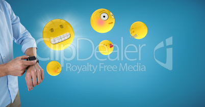 Business man mid section with watch and emojis with flare against blue backround
