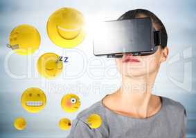 Woman in VR with emojis and flares against blurry grey wood panel